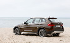 Обои автомобили BMW X1 - 2009