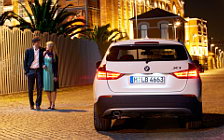 Обои автомобили BMW X1 - 2009